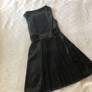 Black silk cocktail dress by BCBG